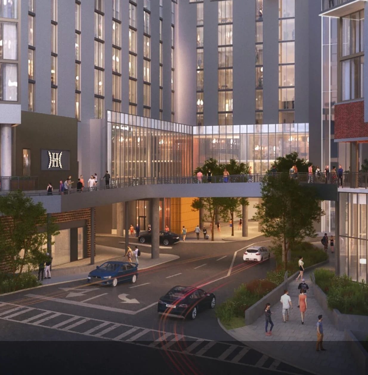 Architectural rendering of the street level at The Henry, showing the pedestrian bridge and building base.